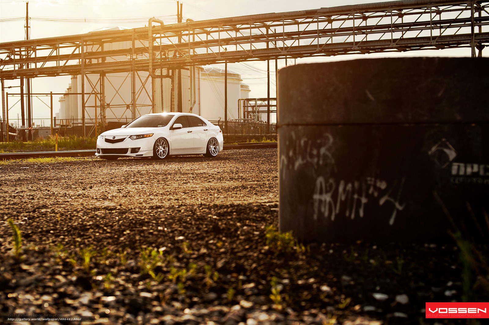 white car in industrial area