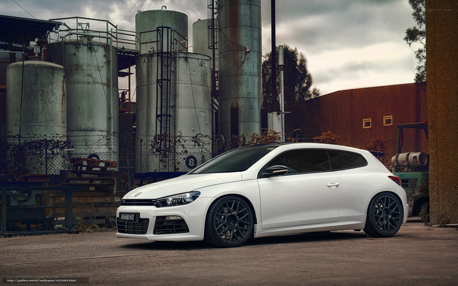 White car in industrial setting
