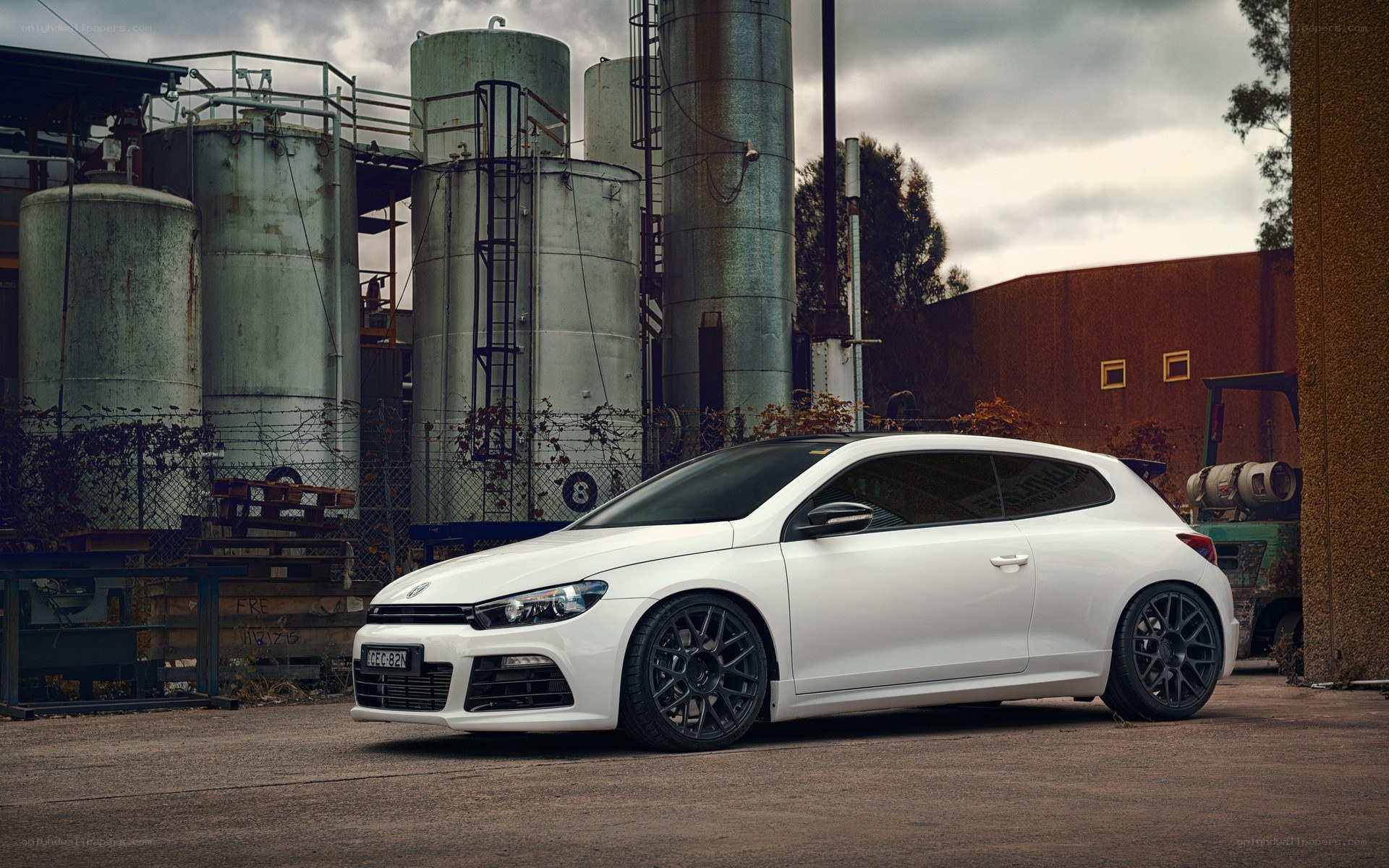 white car in industrial setting