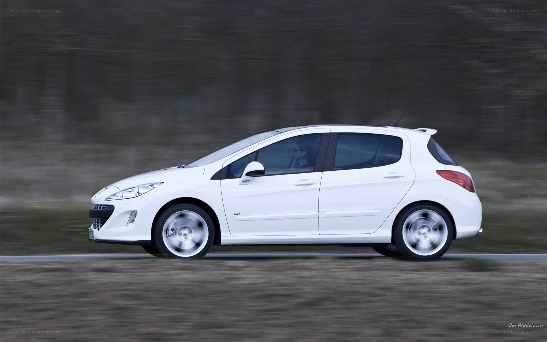 white car in motion