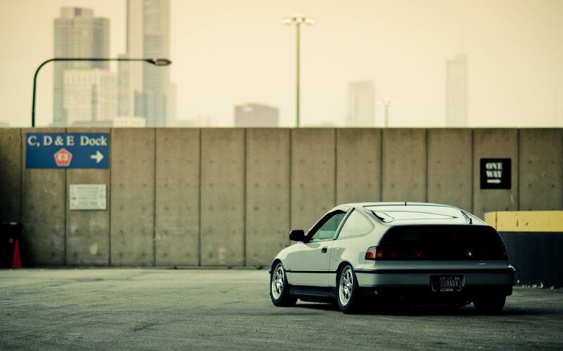 White car in parking garage