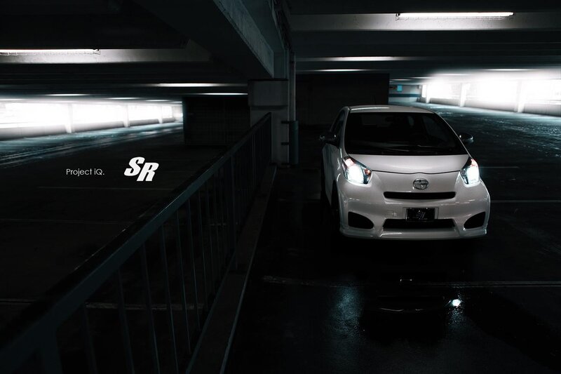 White car in parking garage