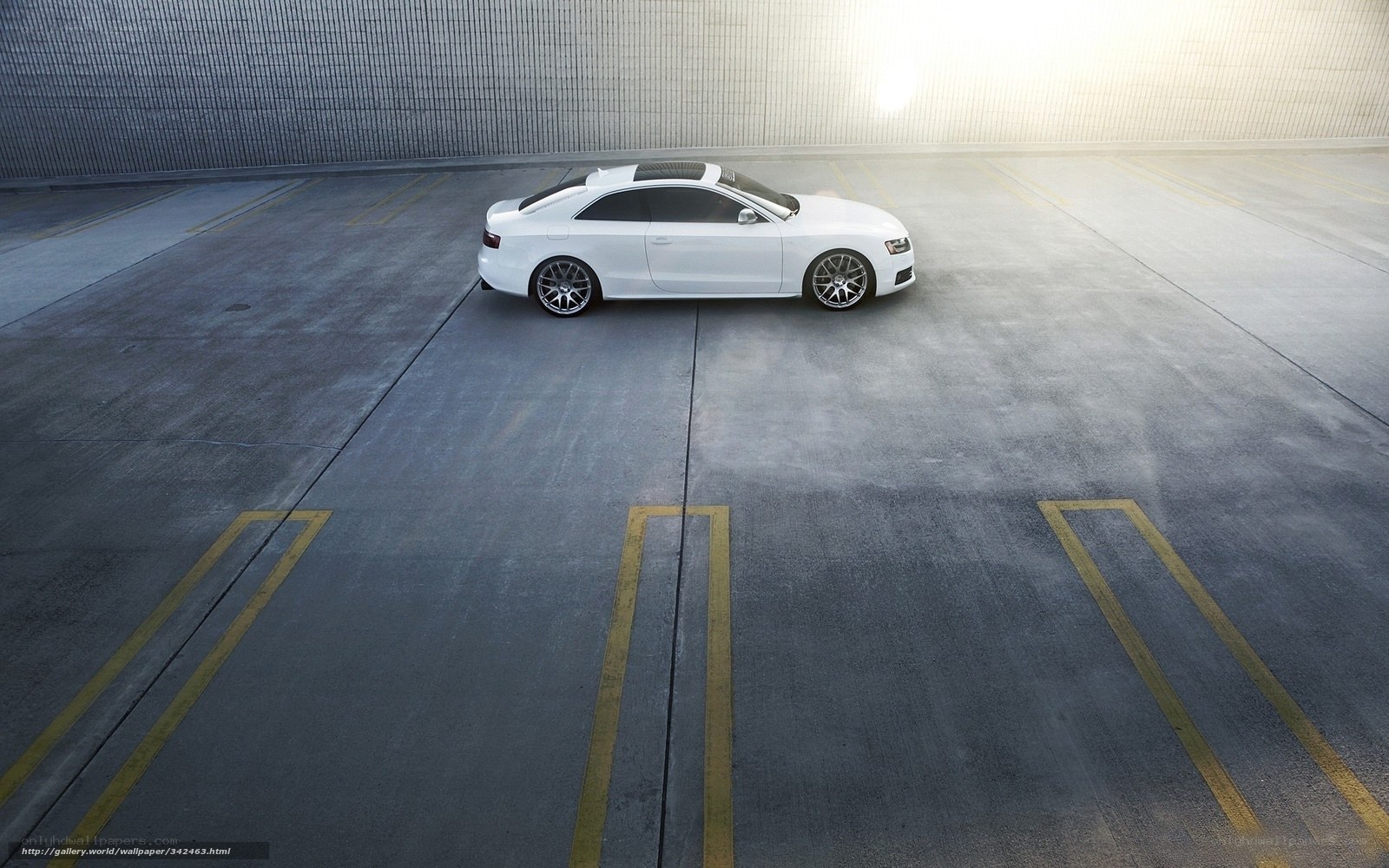 White car in parking garage