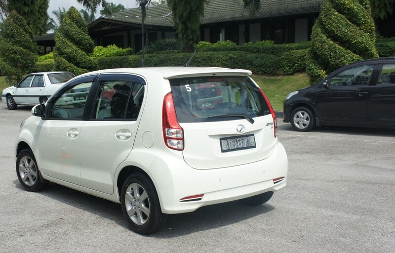 white car in parking lot