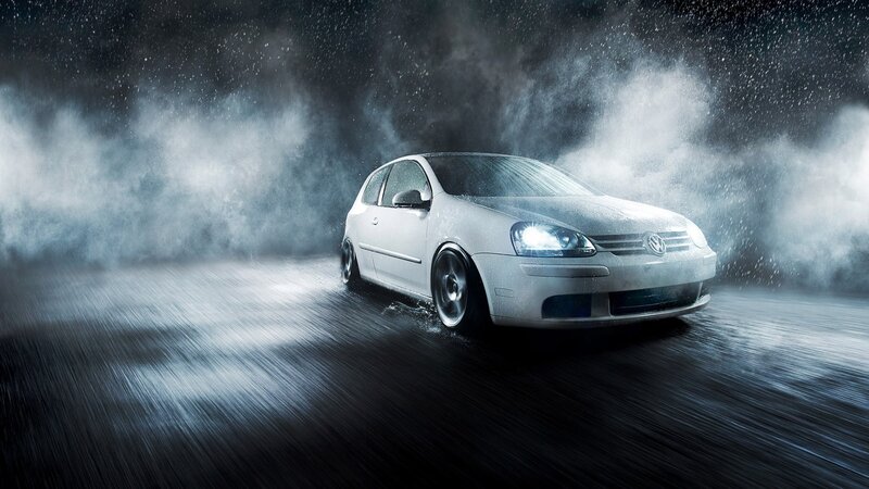 White car in rainy night