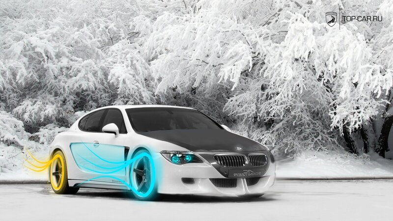 White car in snowy landscape