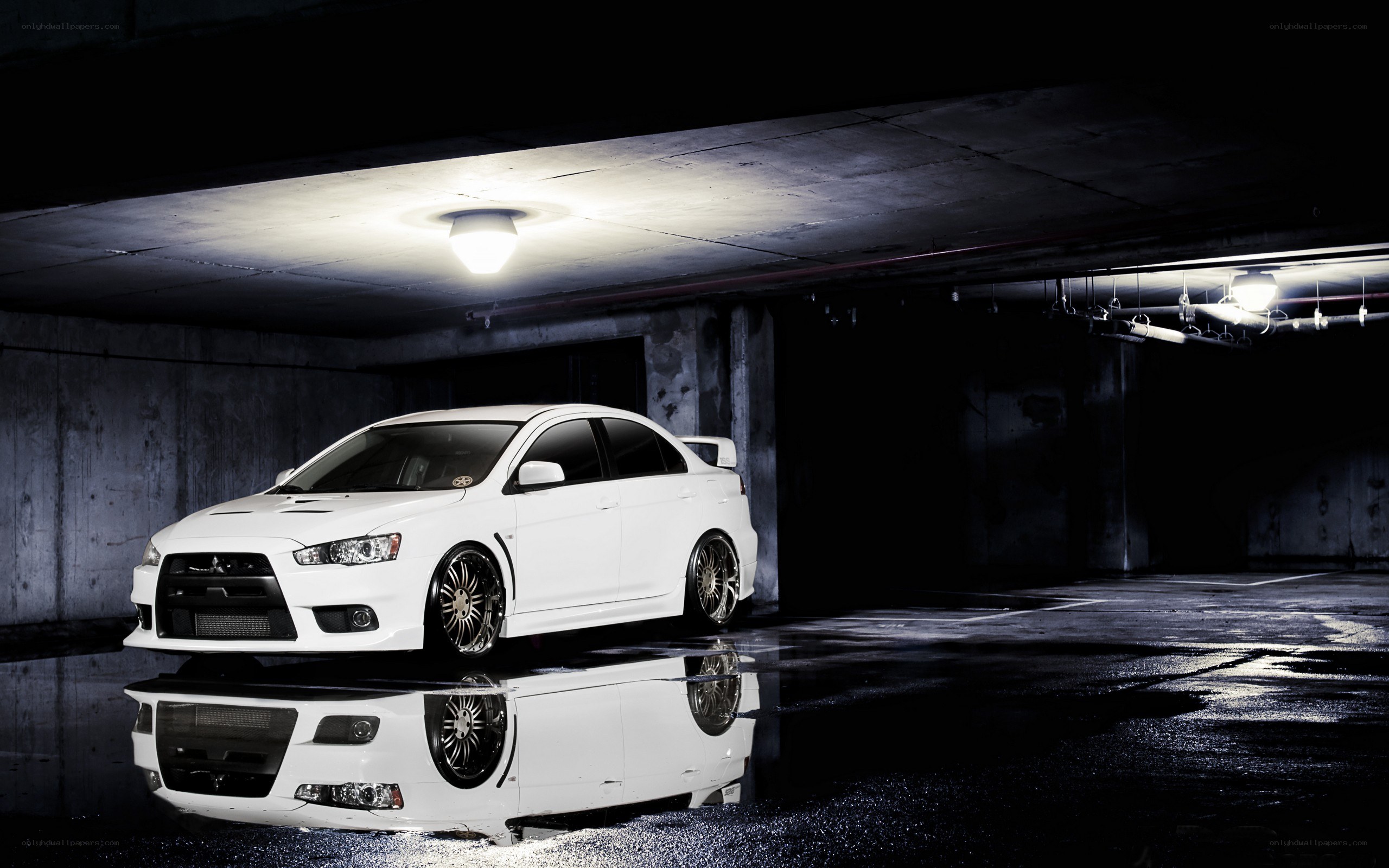 White car in underground garage