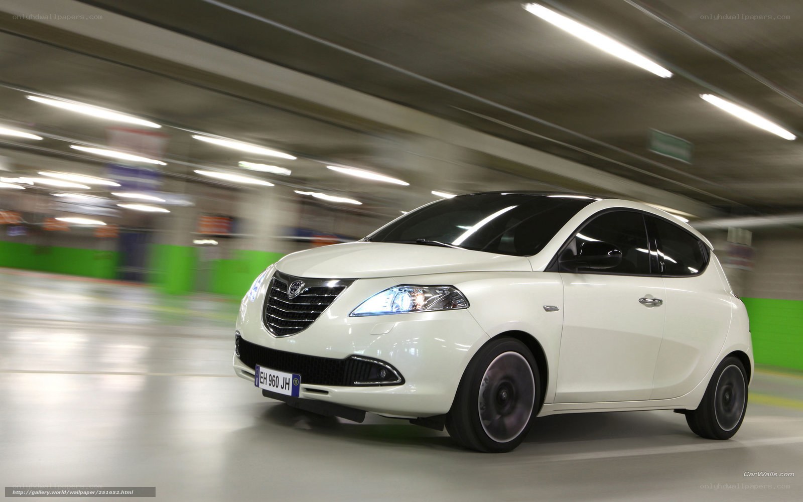 White car in underground parking