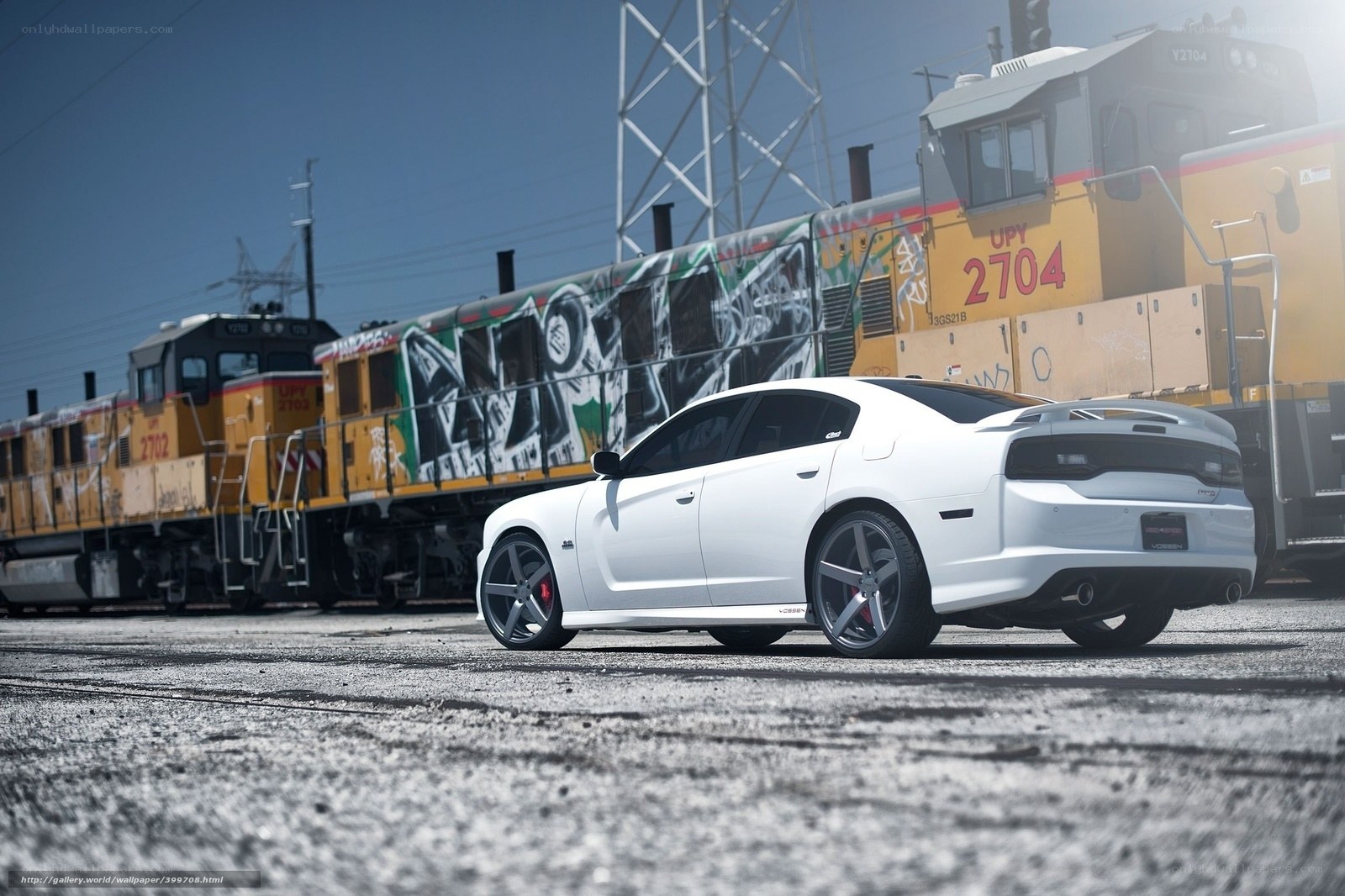 White car near train