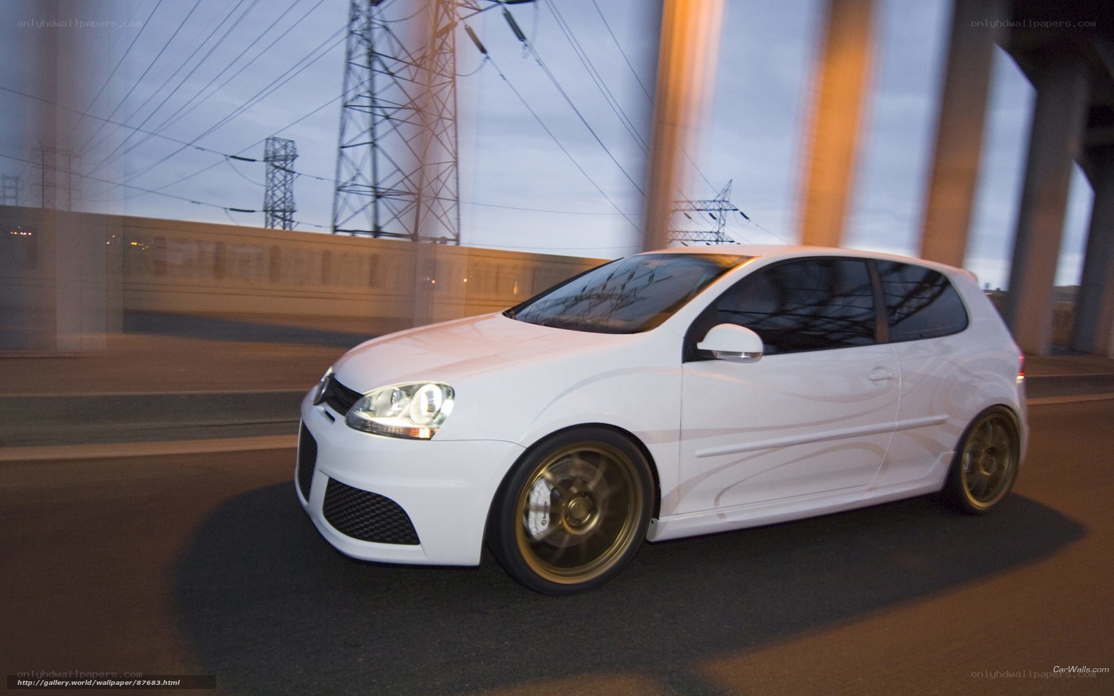 white car on a bridge