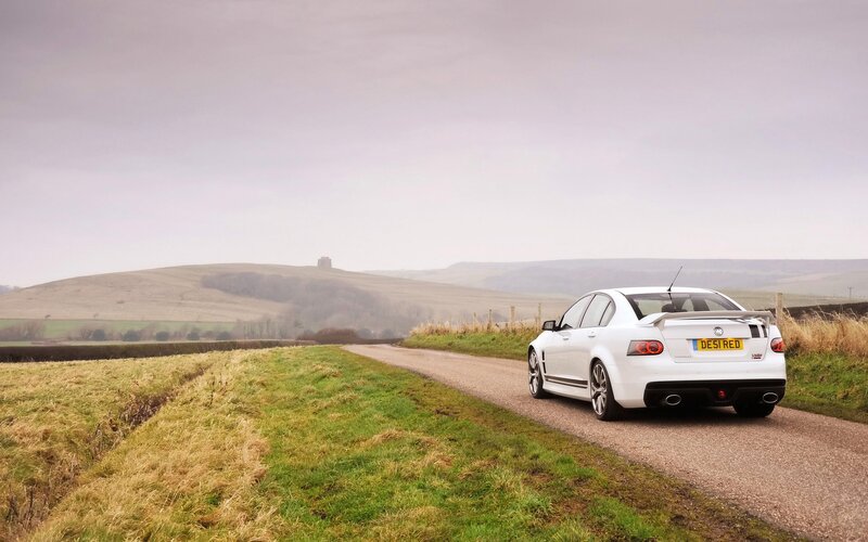 White car on a country road