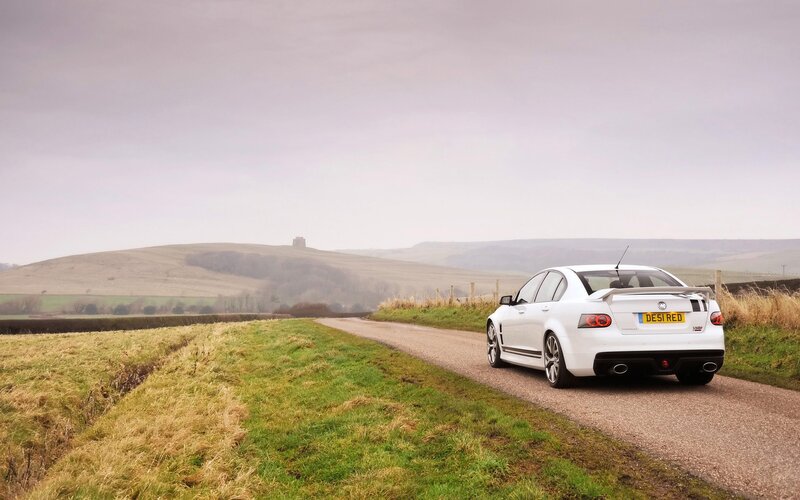 White car on a country road
