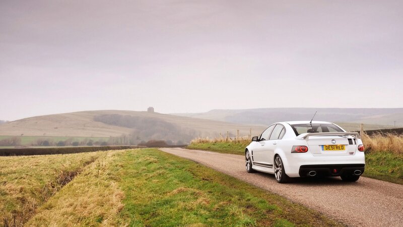 White car on a country road