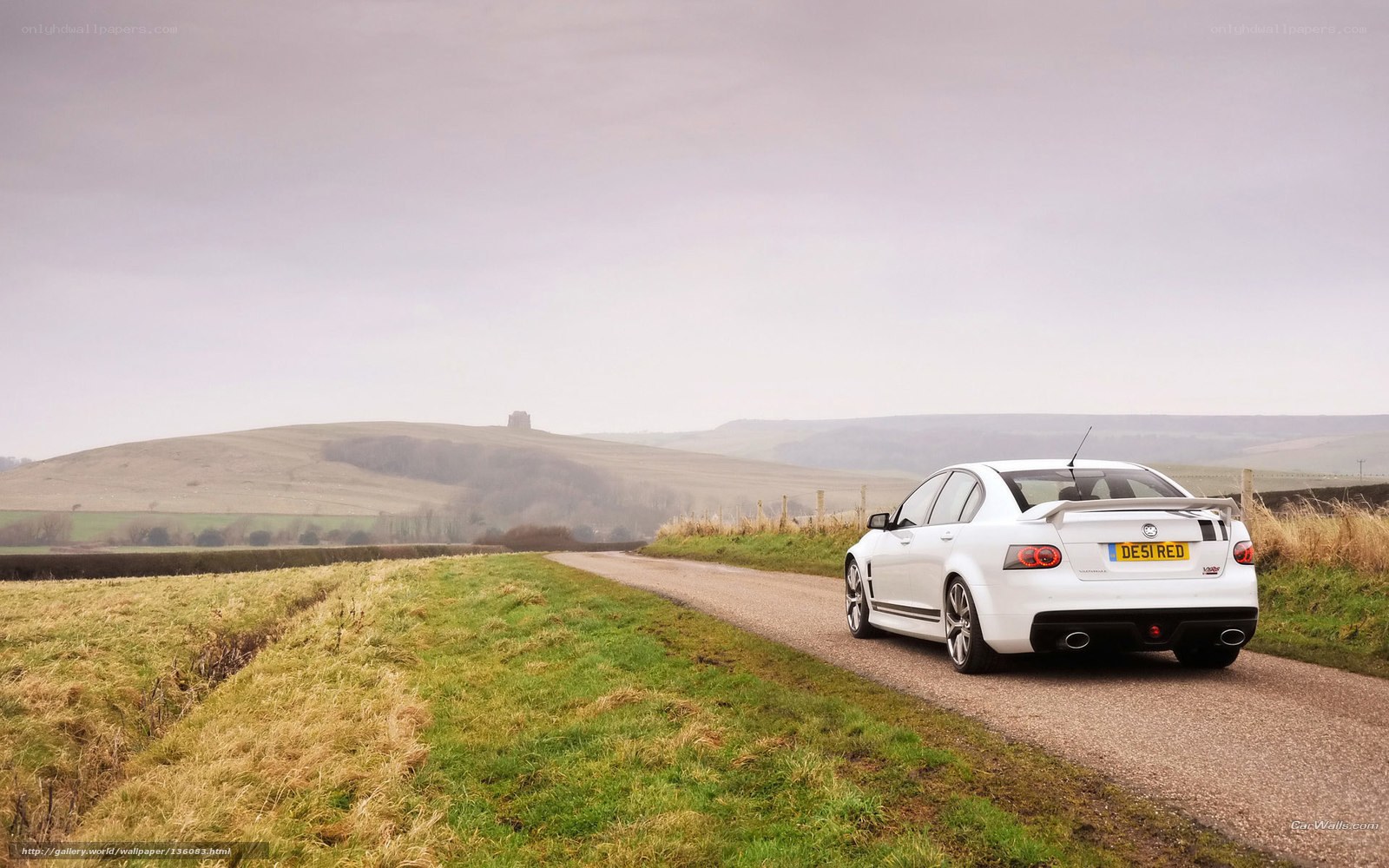 White car on a country road