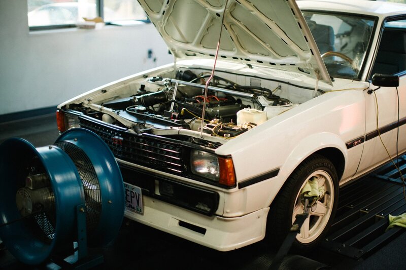 white car on a dynamometer