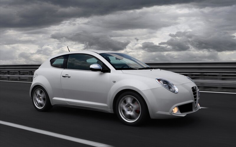 white car on a highway