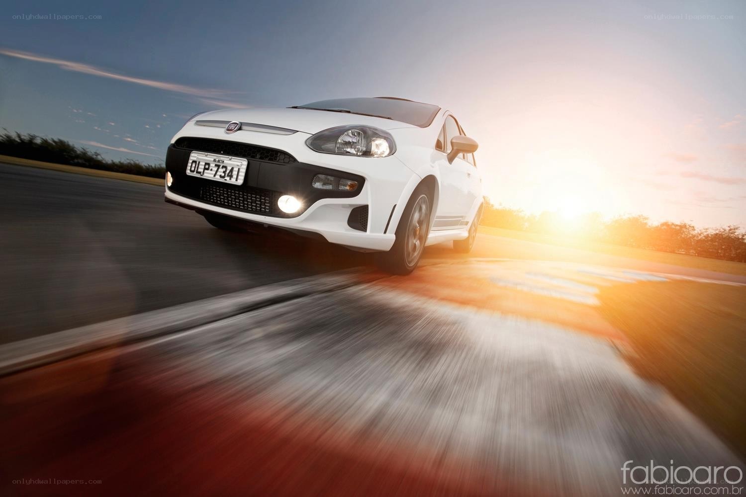 White car on a racetrack