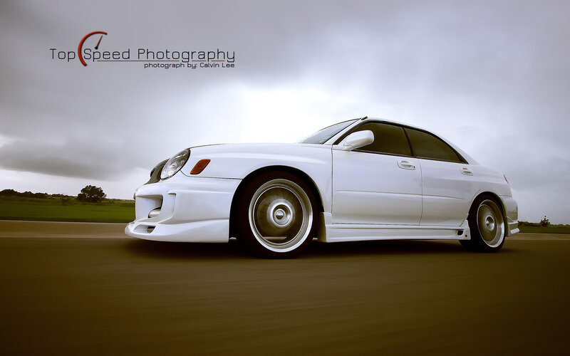 white car on a road