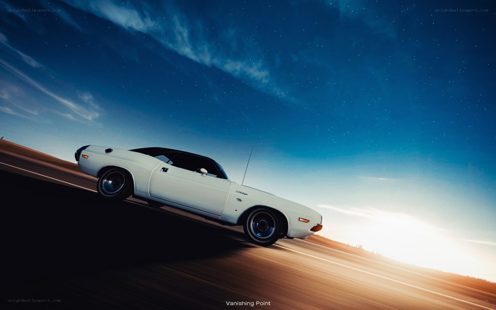 White car on a road at night
