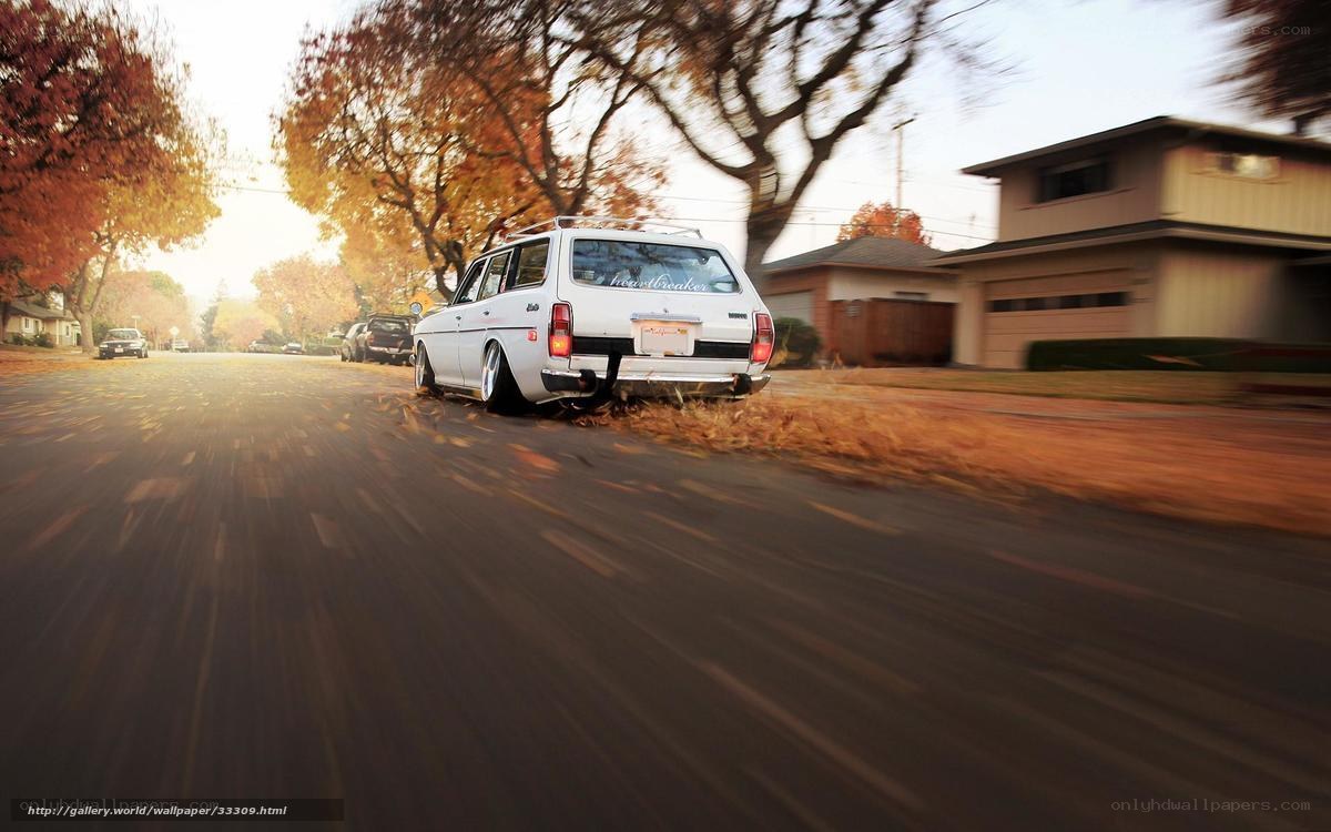White car on autumn street