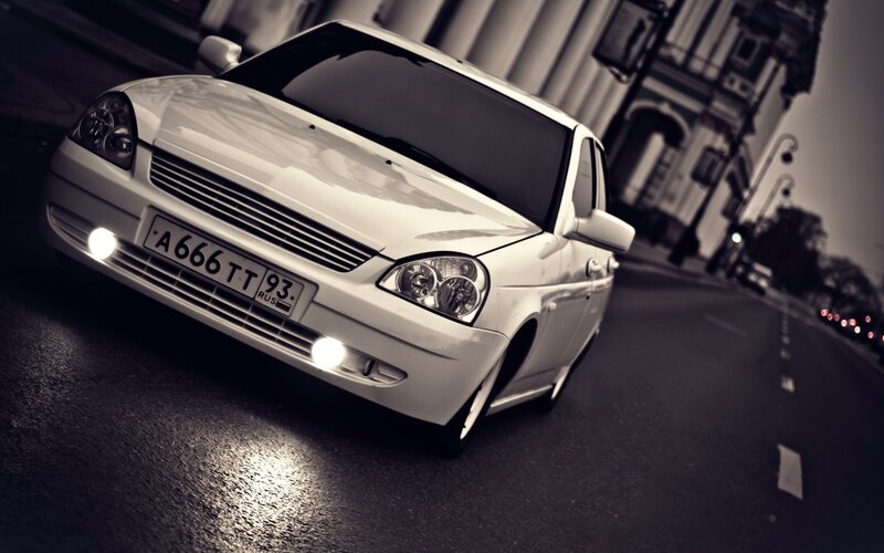 white car on city street