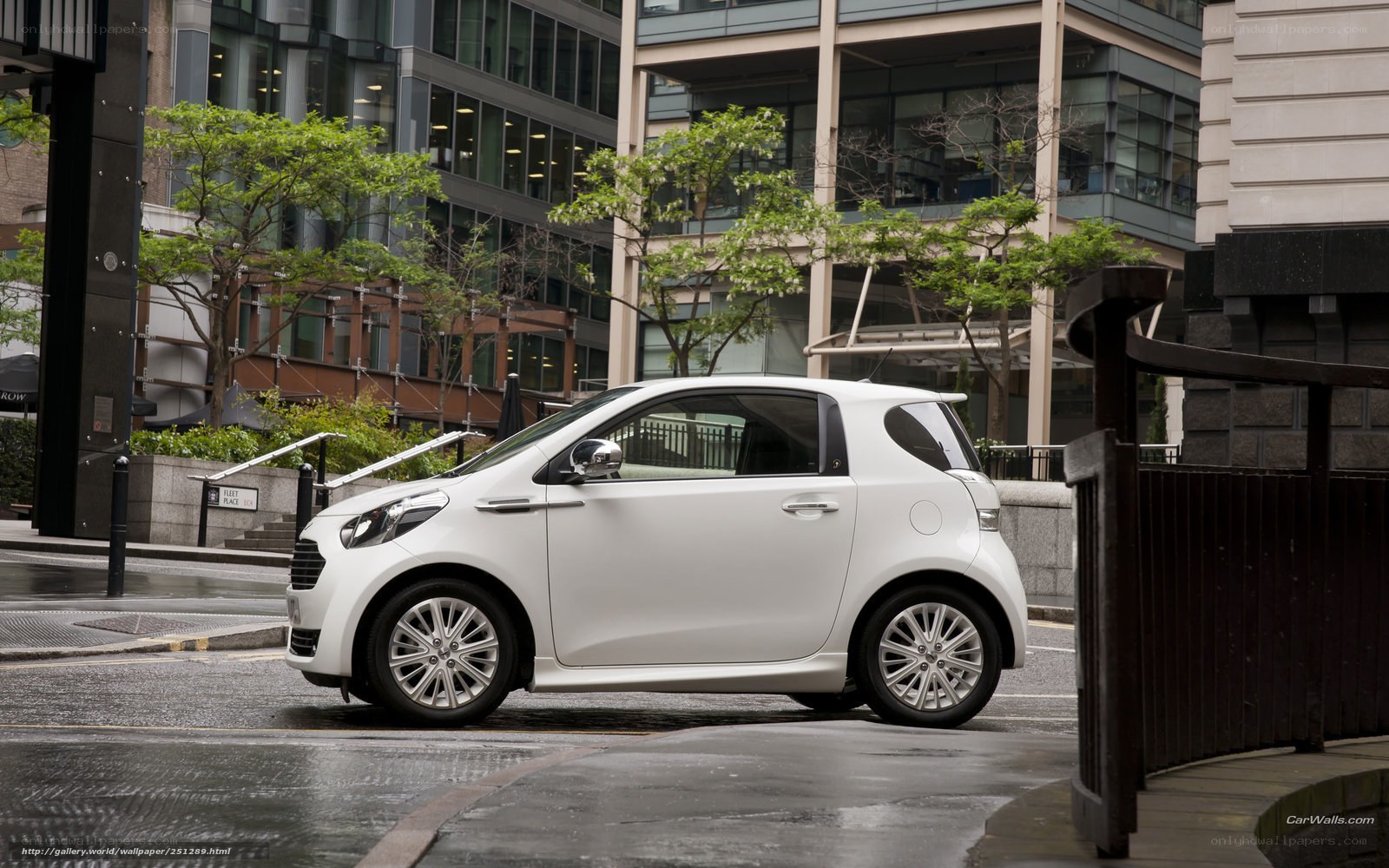 White car on city street
