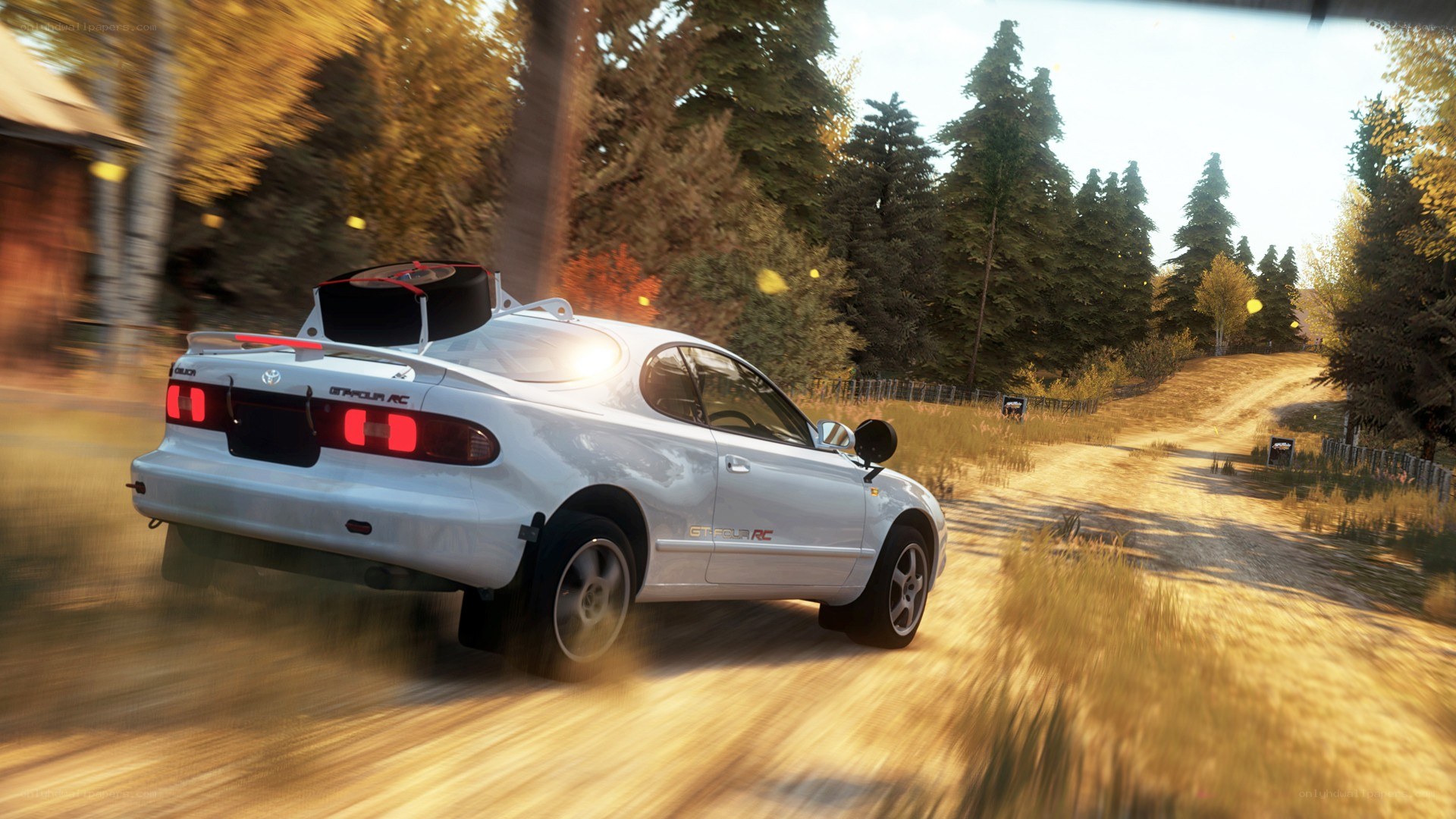 white car on dirt road