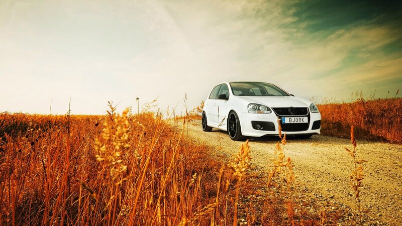 White Car on Dirt Road — Serene
