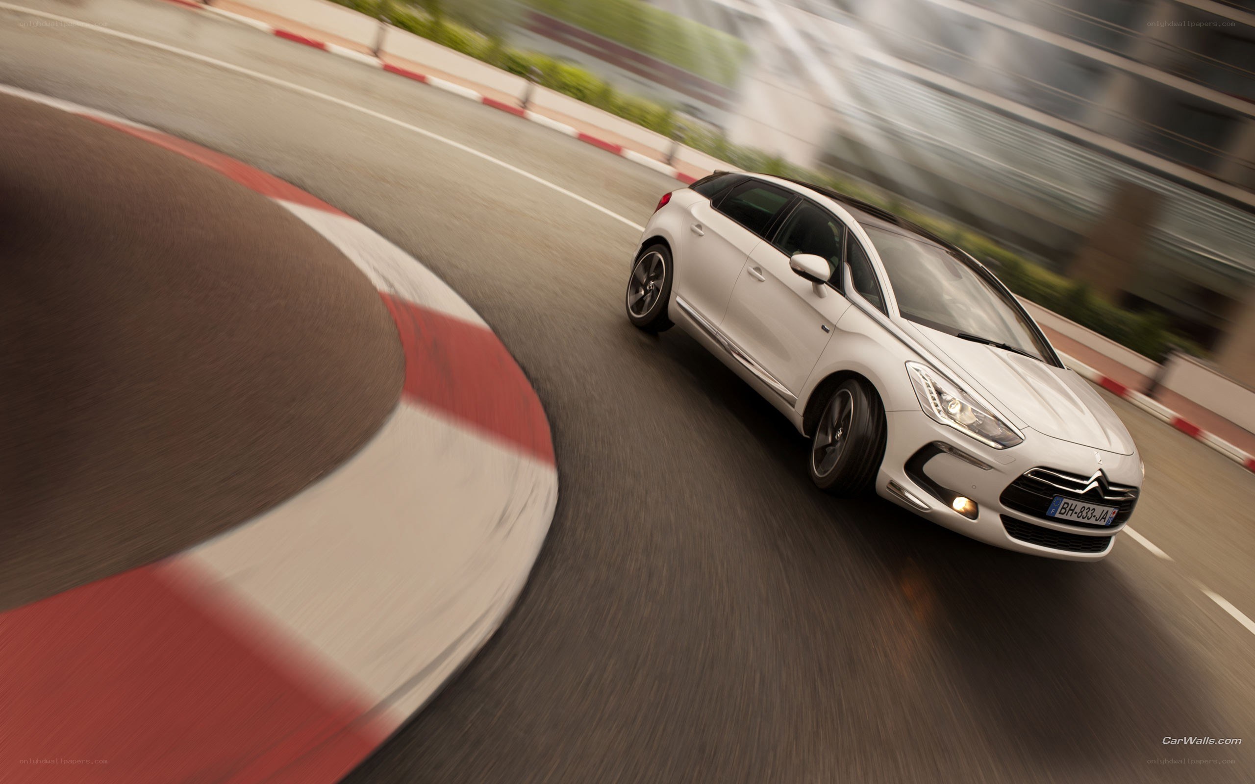white car on racetrack