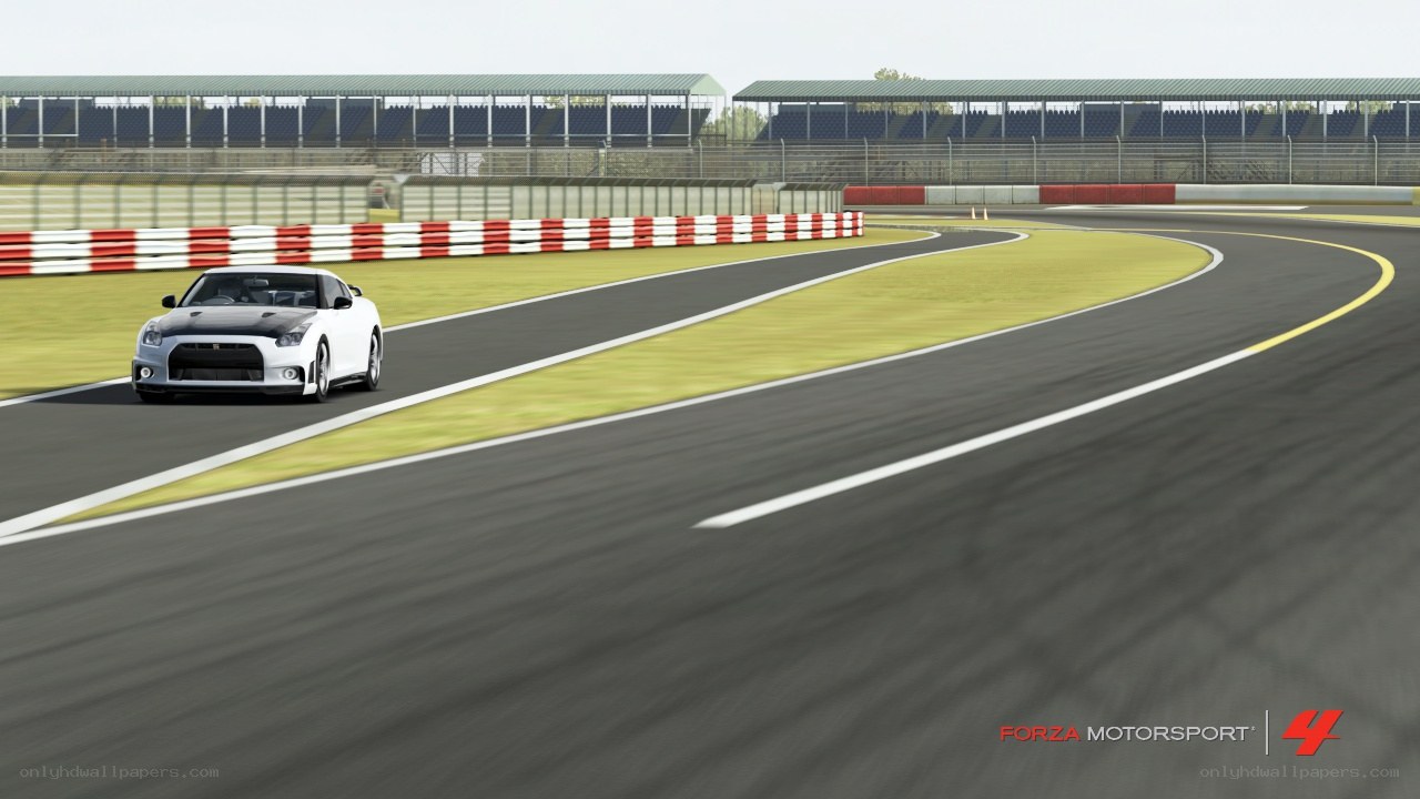 white car on racetrack