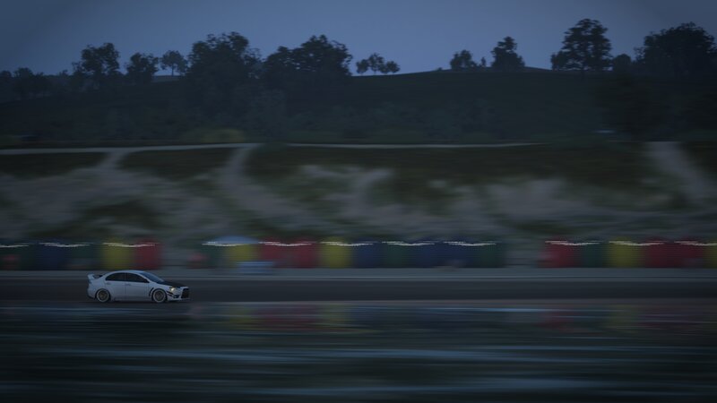 White Car on Racetrack — Dark Blue