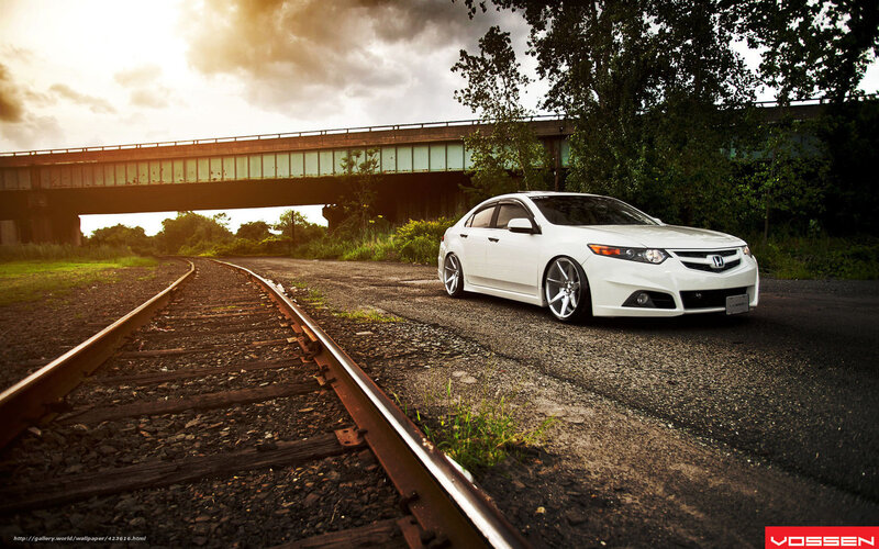 White car on railway tracks