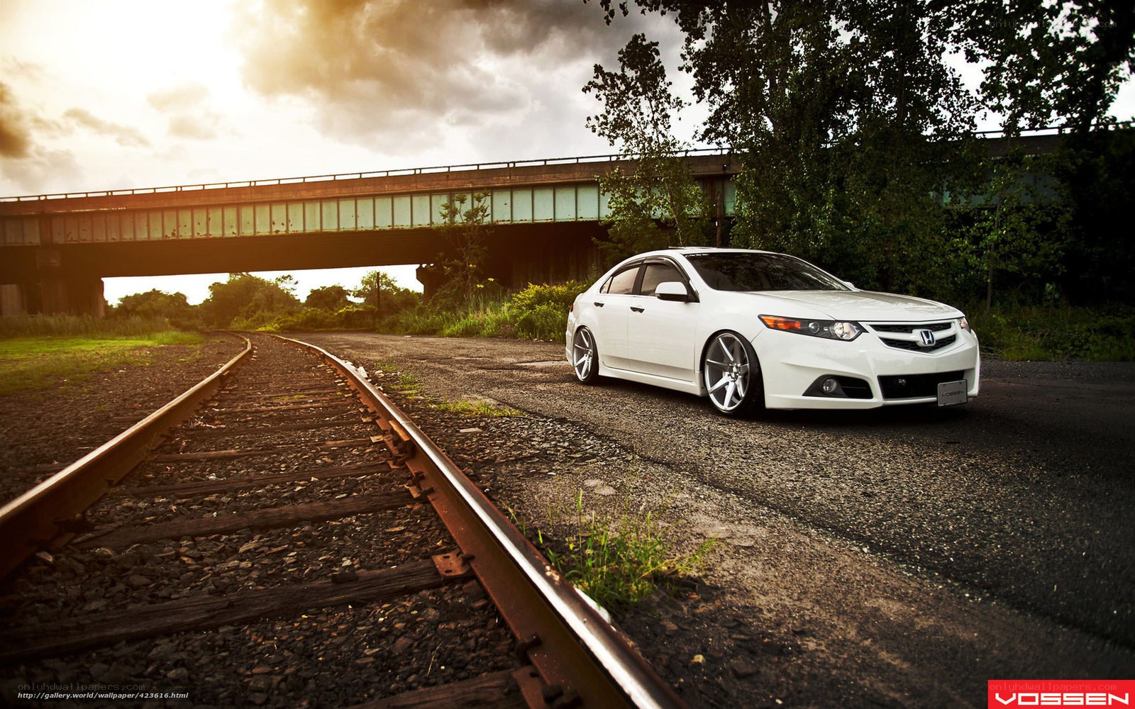 White car on railway tracks