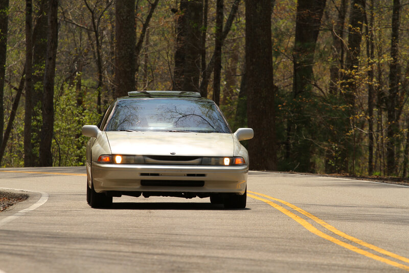 White Car on Road — Gray