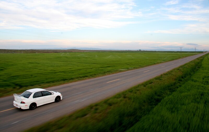 White Car on Road — Green