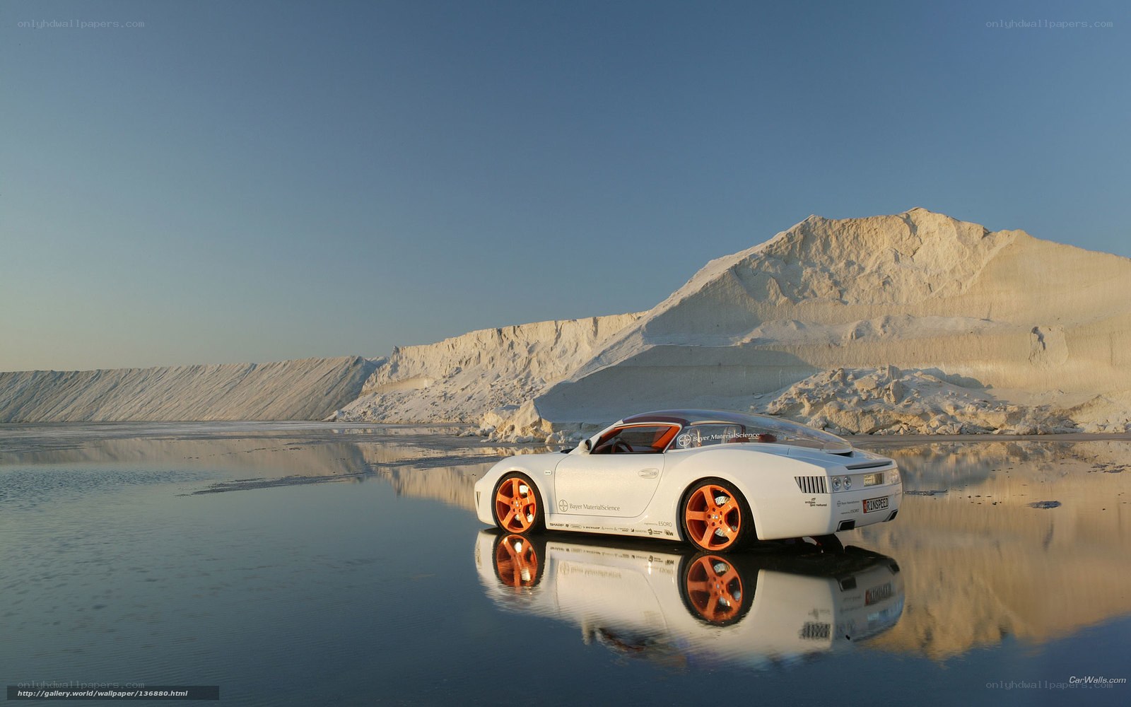White car on salt flats