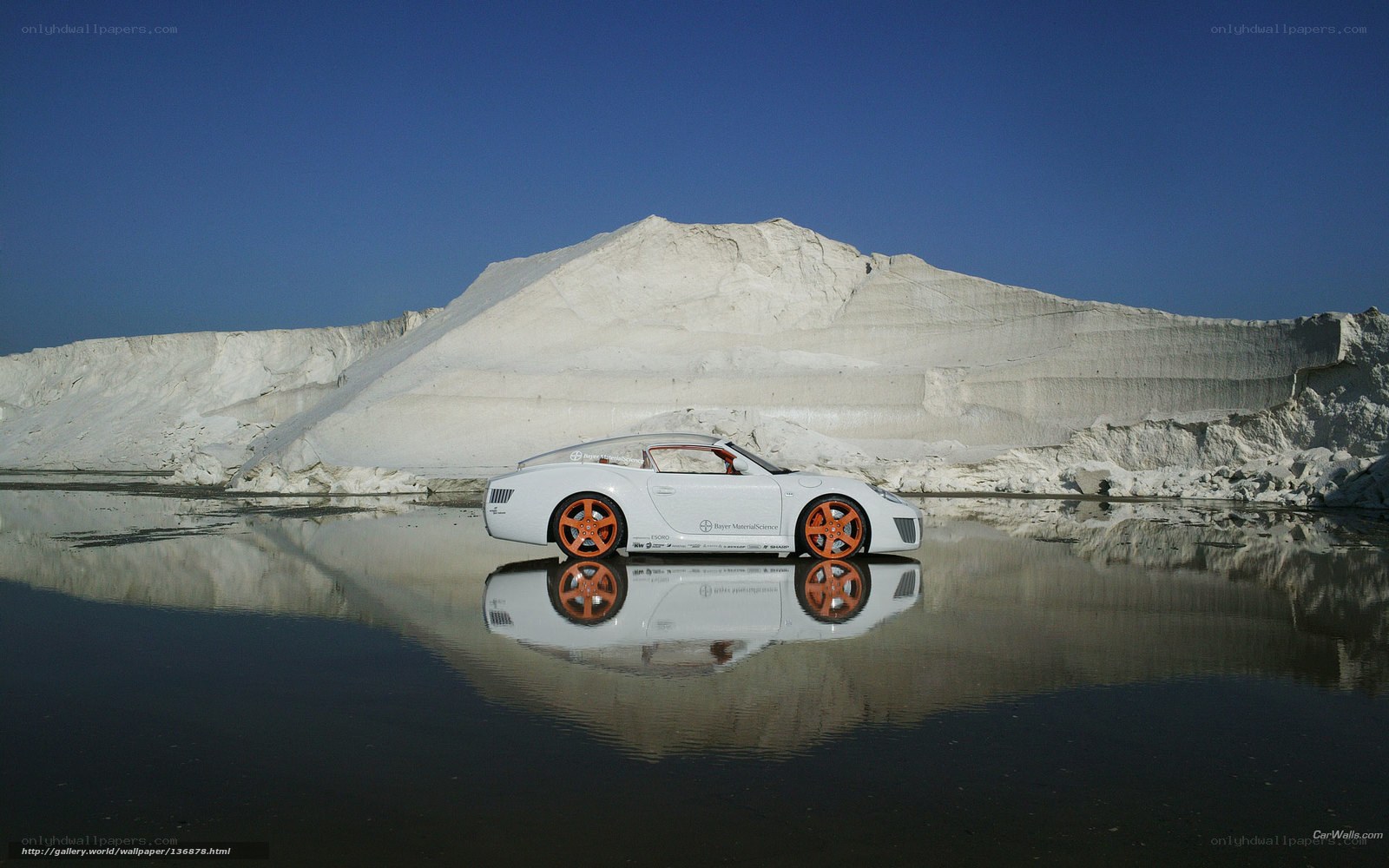 White car on salt mine reflection