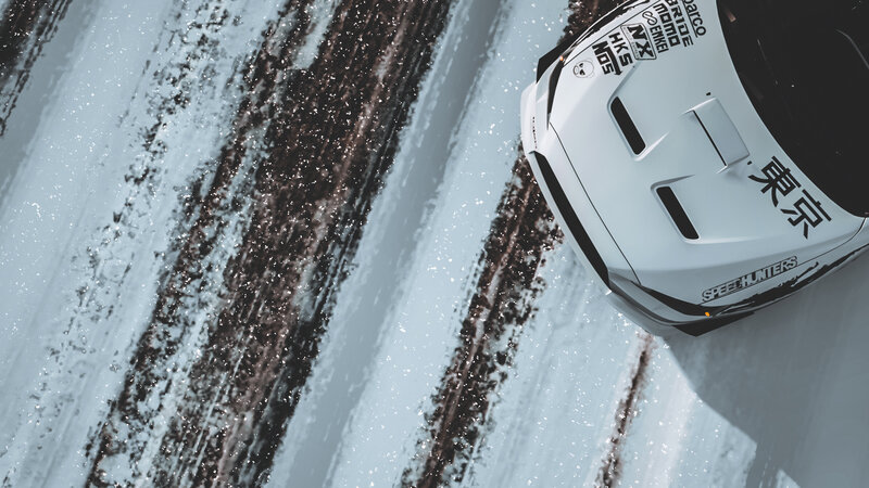 White Car on Snowy Road — Cold