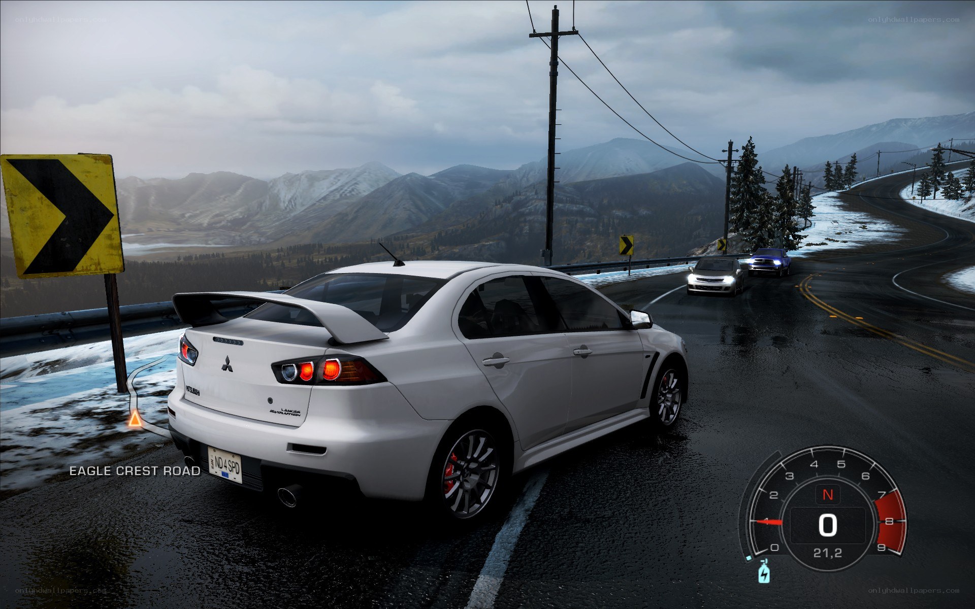 White car on snowy road