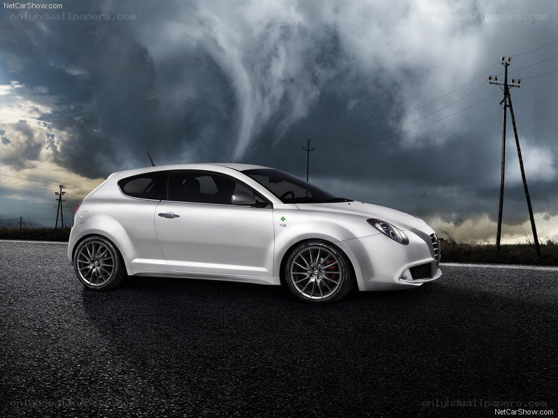 white car on stormy road