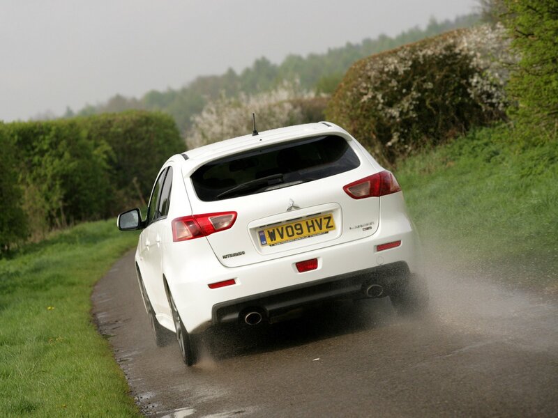 white car on wet road