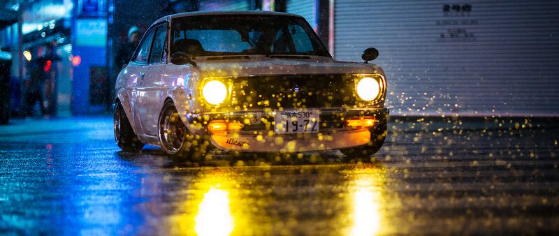 White Car on Wet Street