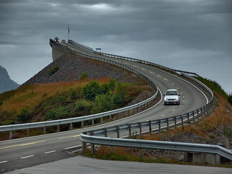 White Car on Winding Road — Gray