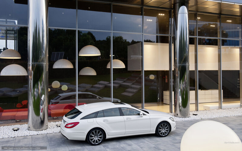 White car outside modern building