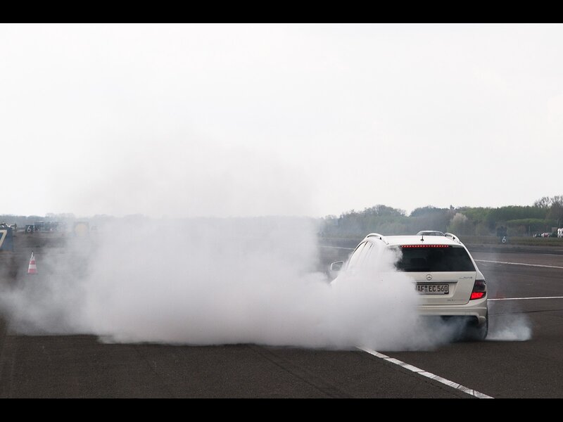 White car performing burnout