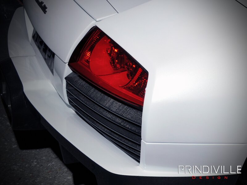 White Car Rear Bumper — Dramatic