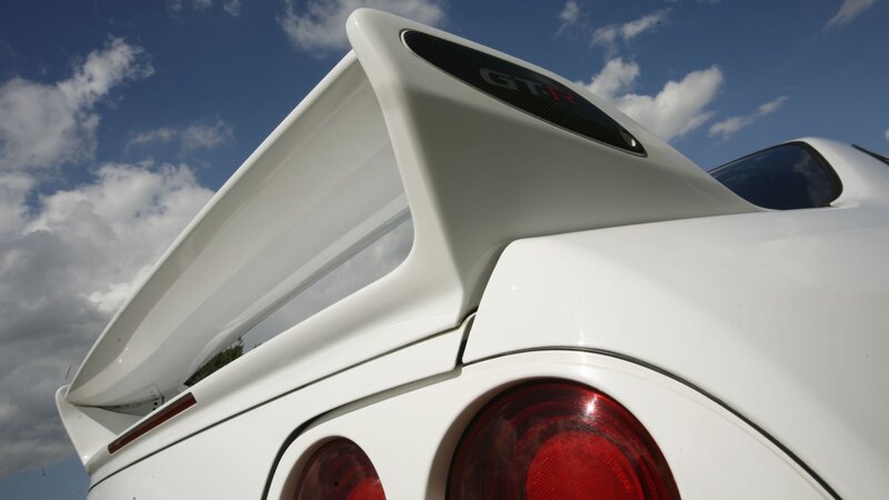White Car Rear Wing — Dramatic