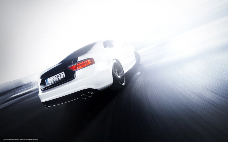 White car speeding on road