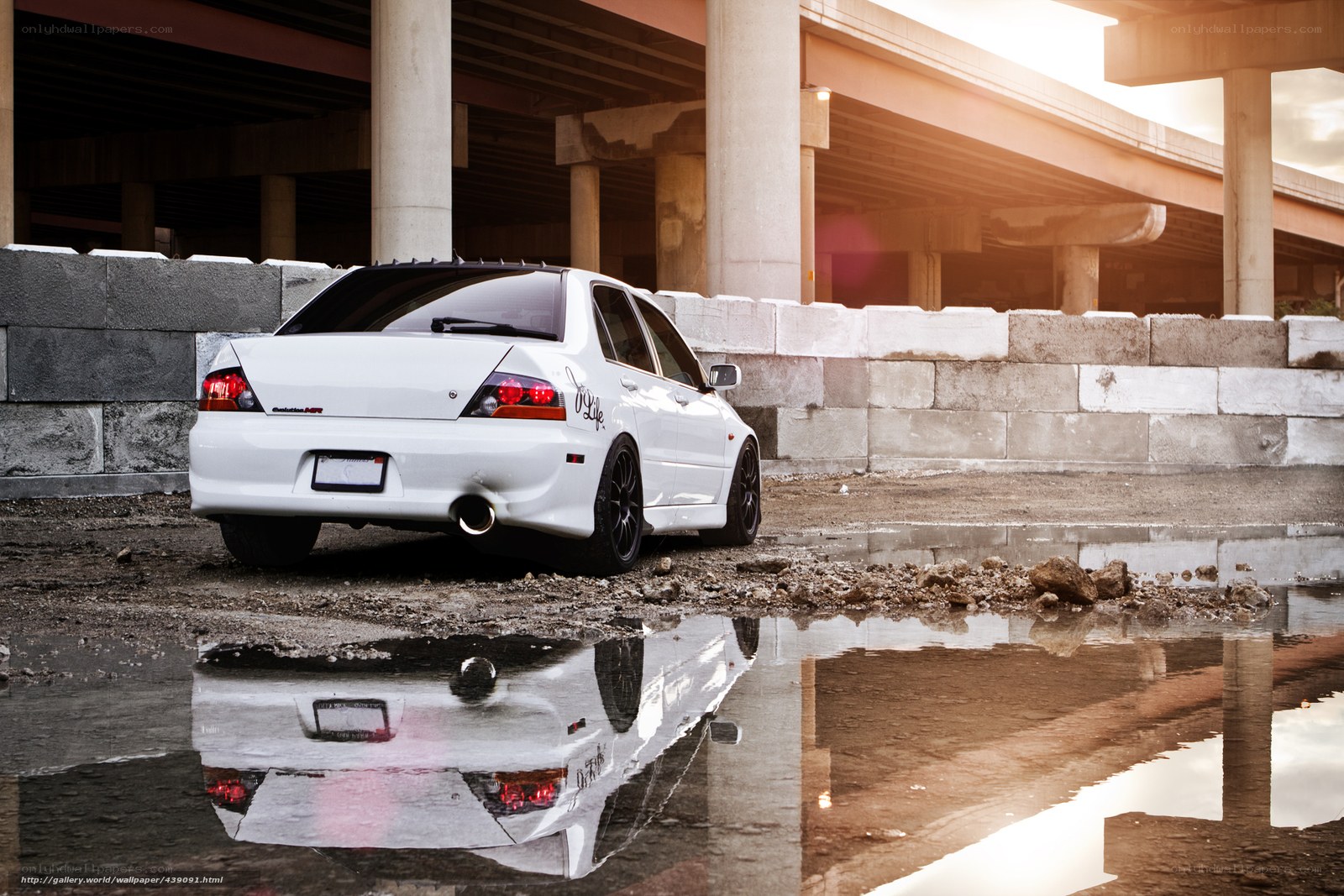 White car under highway