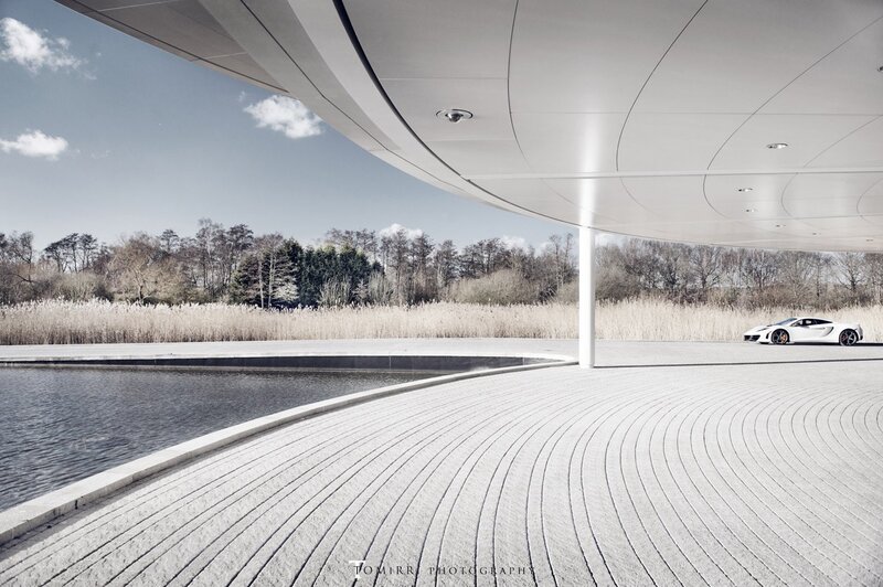 White car under modern canopy